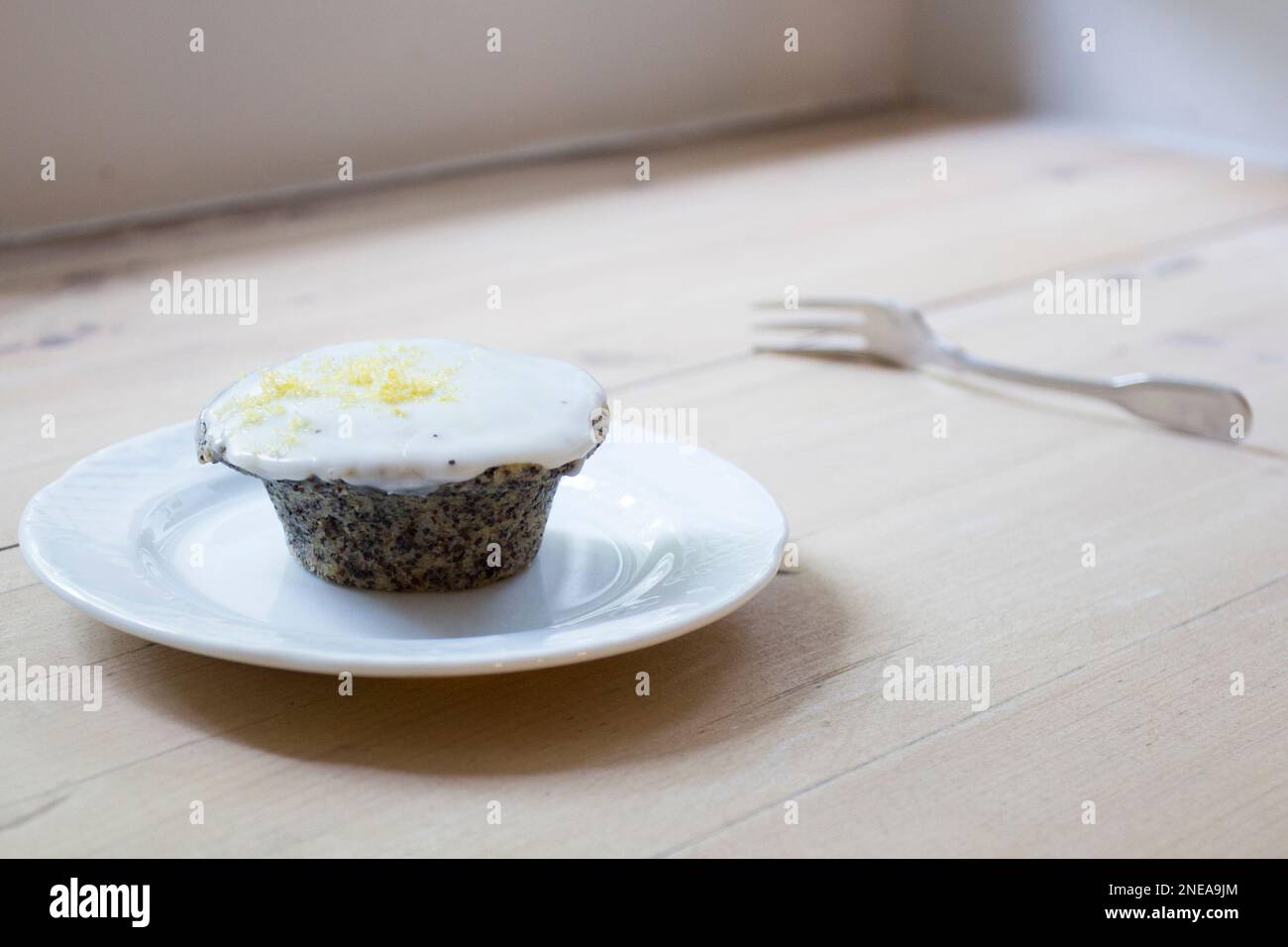 Poppy seed muffins made in a German patisserie Stock Photo Alamy