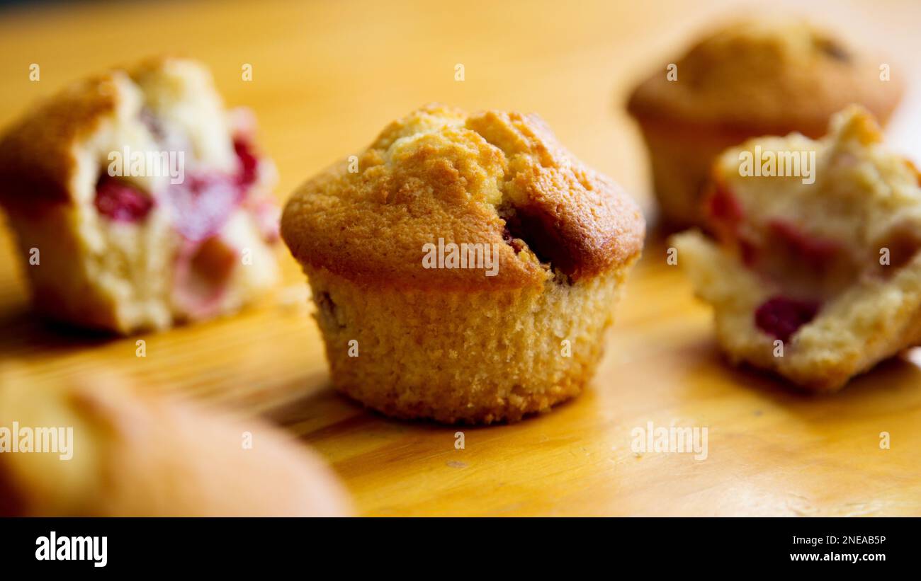 Candied cherry muffins made in a German patisserie Stock Photo Alamy