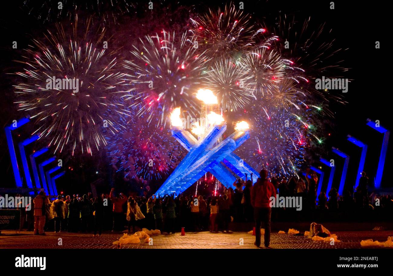 Fire works explode after Wayne Gretzky lit the Olympic cauldron during ...