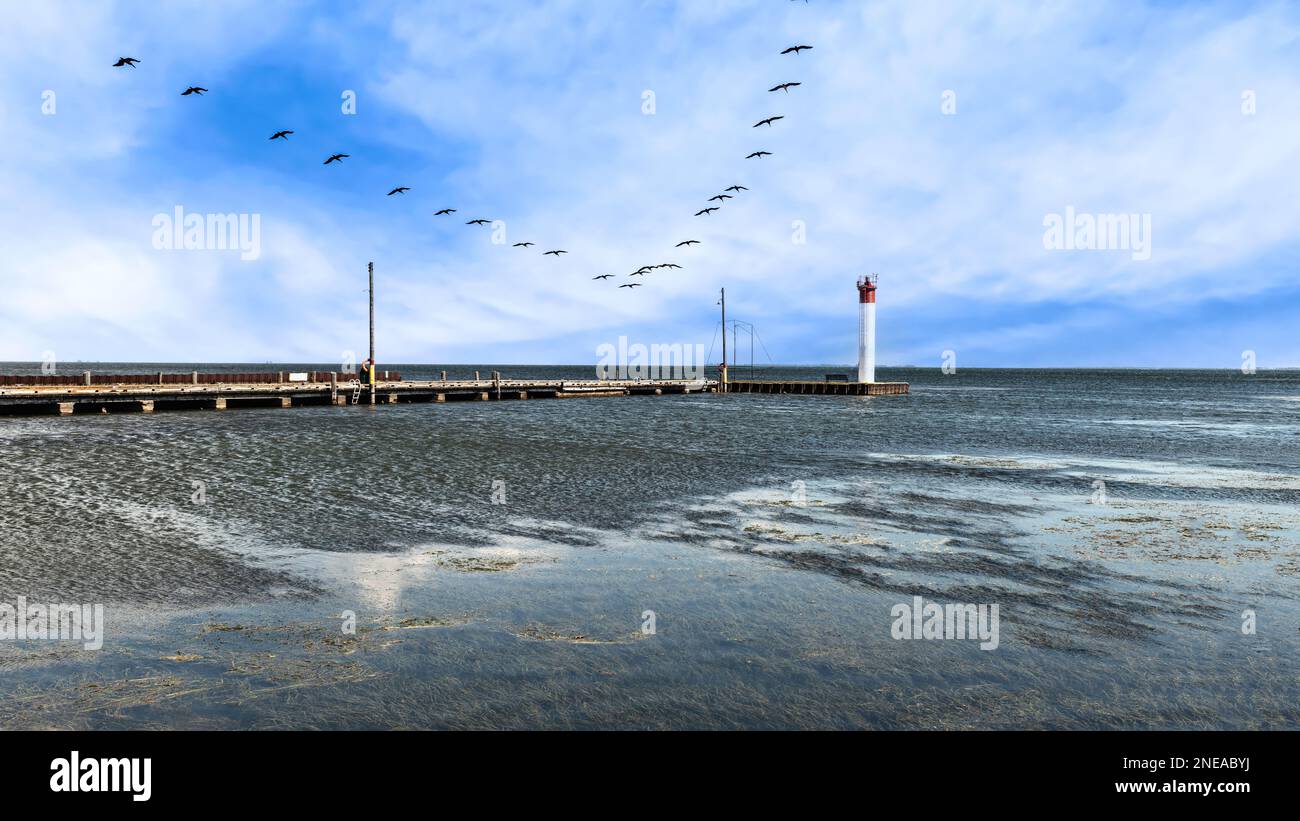 View the pier at Port Rowan harbor on Lake Erie in Ontario, Canada. Stock Photo