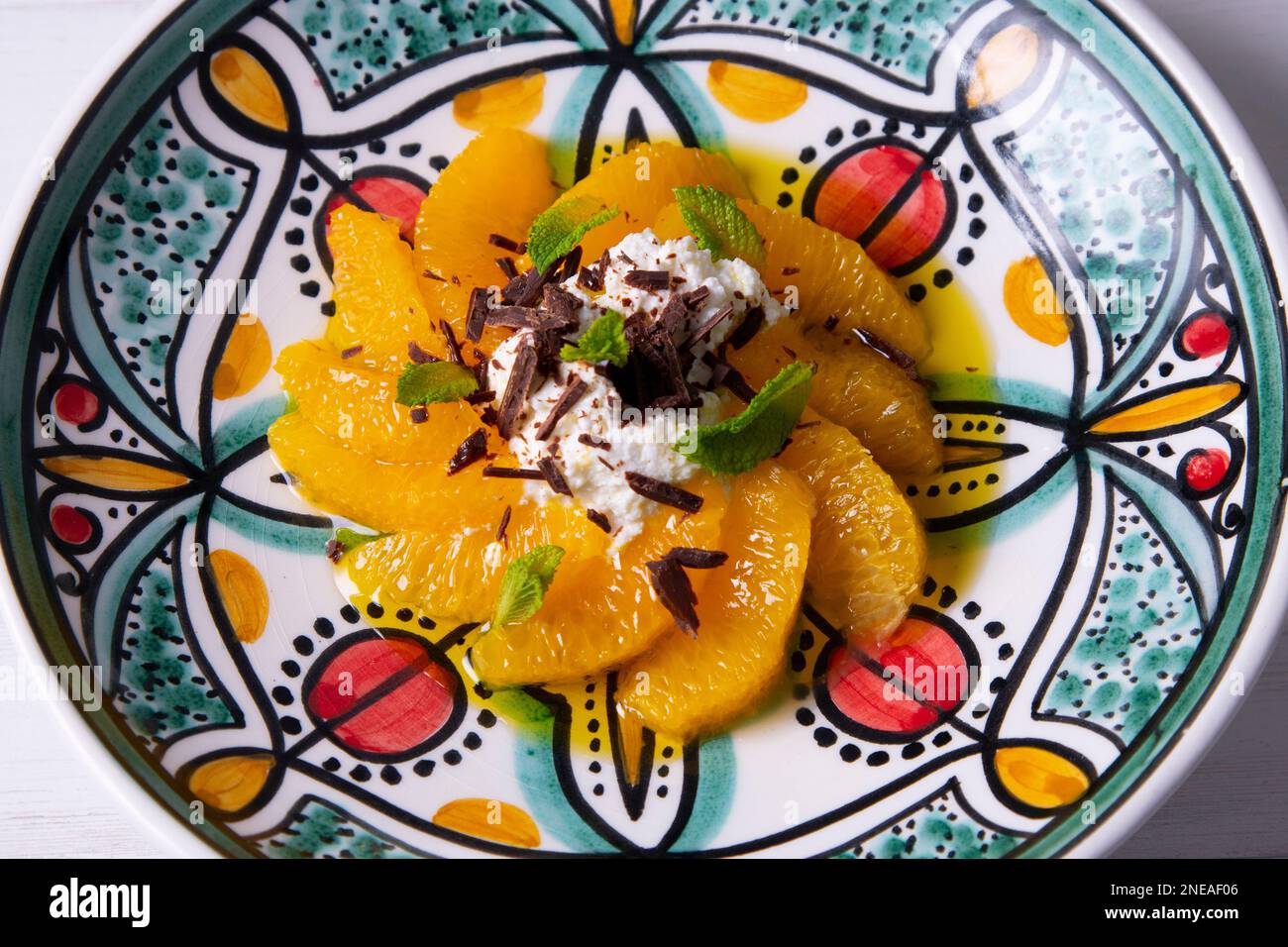 Spiced oranges with cloves and cinnamon served with organic honey and