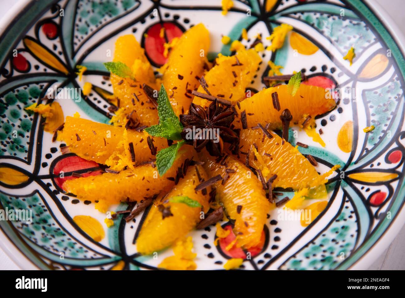 Spiced oranges with cloves and cinnamon served with organic honey and