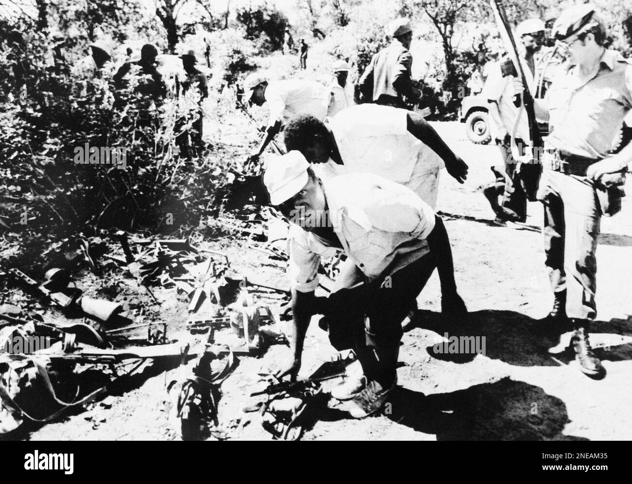 Guerillas lay down their arms under the watchful eye of a British ...