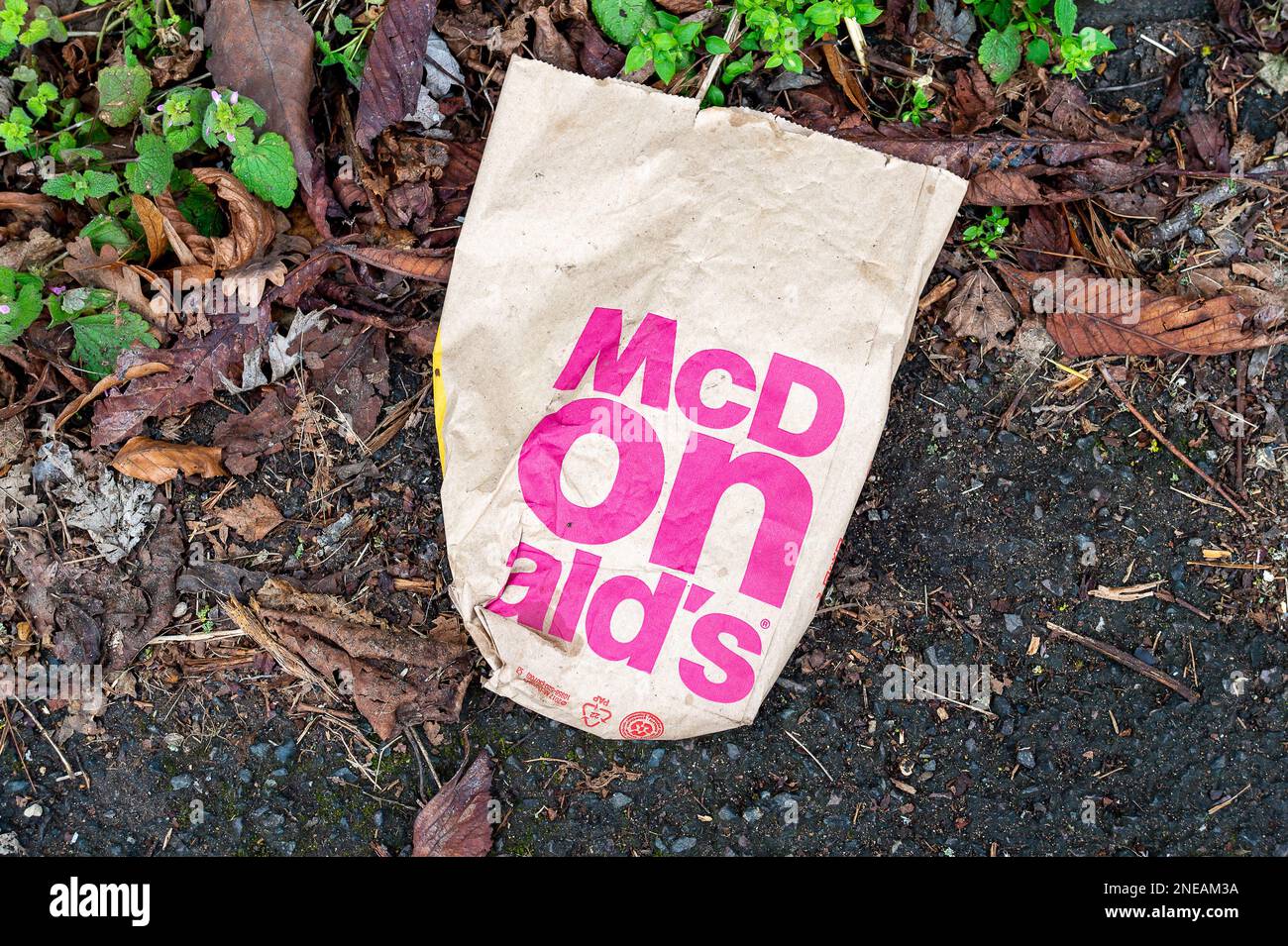 Slough, Berkshire, UK. 16th February, 2023. The familiar sight of McDonald's litter. Fast food giant McDonalds's have announced price increases on four of their food items and one drink due to the rising food and energy costs. The highest increase is on their Mayo Chicken which is going up from 99p to £1.19 which is a percentage increase of 20%. Credit: Maureen McLean/Alamy Live News Stock Photo
