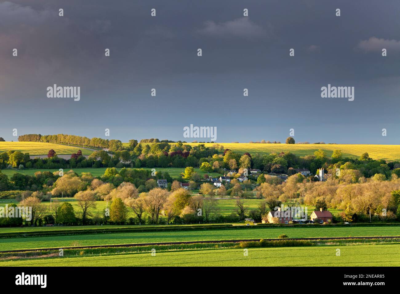 A view of the villages of Bapton and Fisherton de la Mere in the Wylye Valley, Wiltshire. Stock Photo