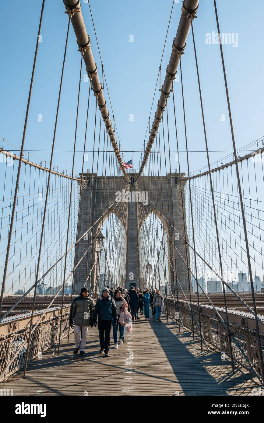 New York, USA November 21, 2022 People walking on Brooklyn Bridge, a