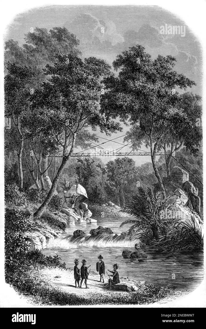 Dayak Bamboo Footbridge Crossing a River in the Rainforest or Borneo. Vintage Engraving or Illustration 1862 Stock Photo