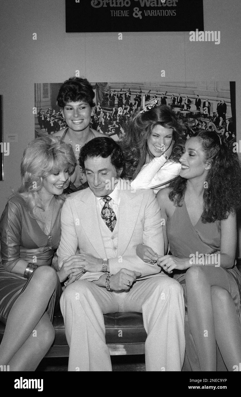 Penthouse publisher Bob Guccione poses with former "Penthouse Pets