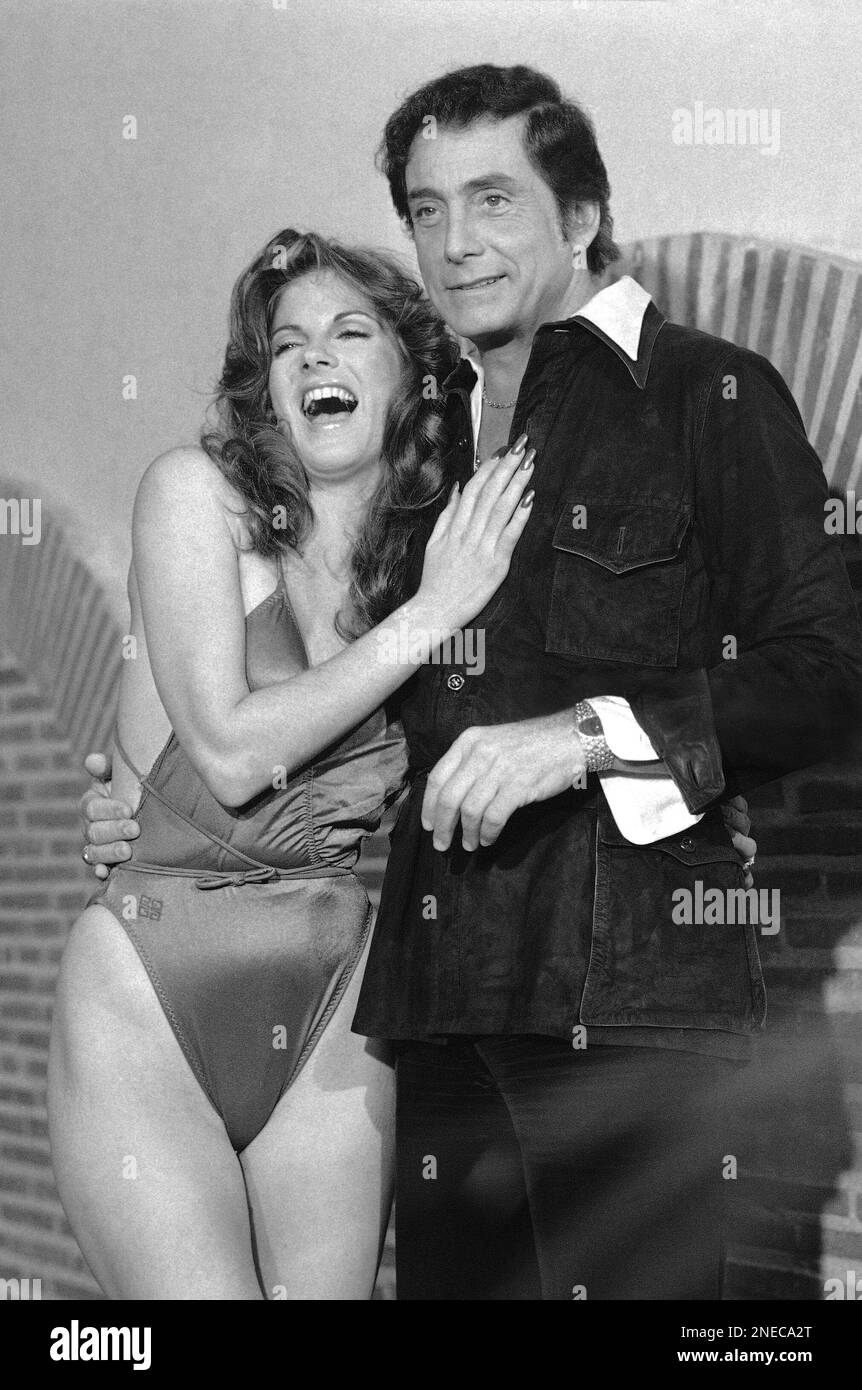 Danielle Deneux, Penthouse "Pet of the Year" poses with publisher Bob