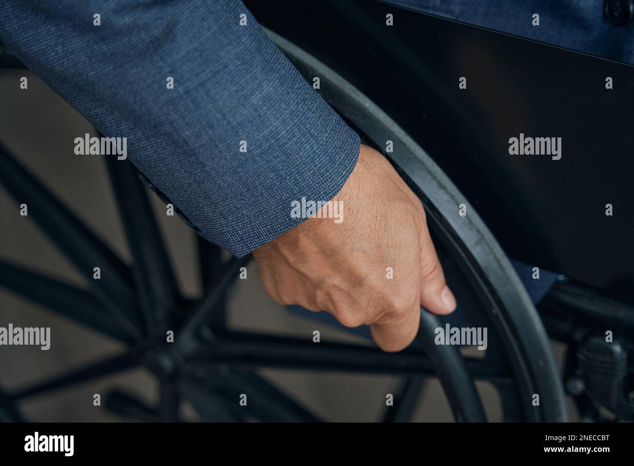 Male boss on wheelchair hi-res stock photography and images - Alamy