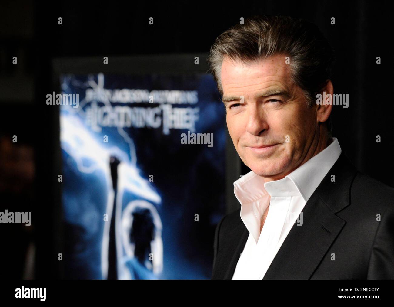 Actor Pierce Brosnan attends the premiere of "Percy Jackson and The