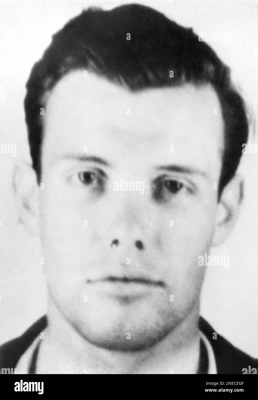 The FBI on February 19, announced the arrest of Dale H. Maple, a U.S. Army private, on a charge of treason for allegedly aiding two German prisoners of war, to escape from an internment camp at Camp Hale, Colorado, Feb. 20, 1944, where Maple was stationed on February 15. The three were apprehended south of the Mexican border by an American customs official. Maple, born in San Diego, Calif., attended Harvard, where he was dismissed from the Reserve Officers Training Corps for pro-Nazi sympathies in 1940, the FBI said. (AP Photo) Stock Photo