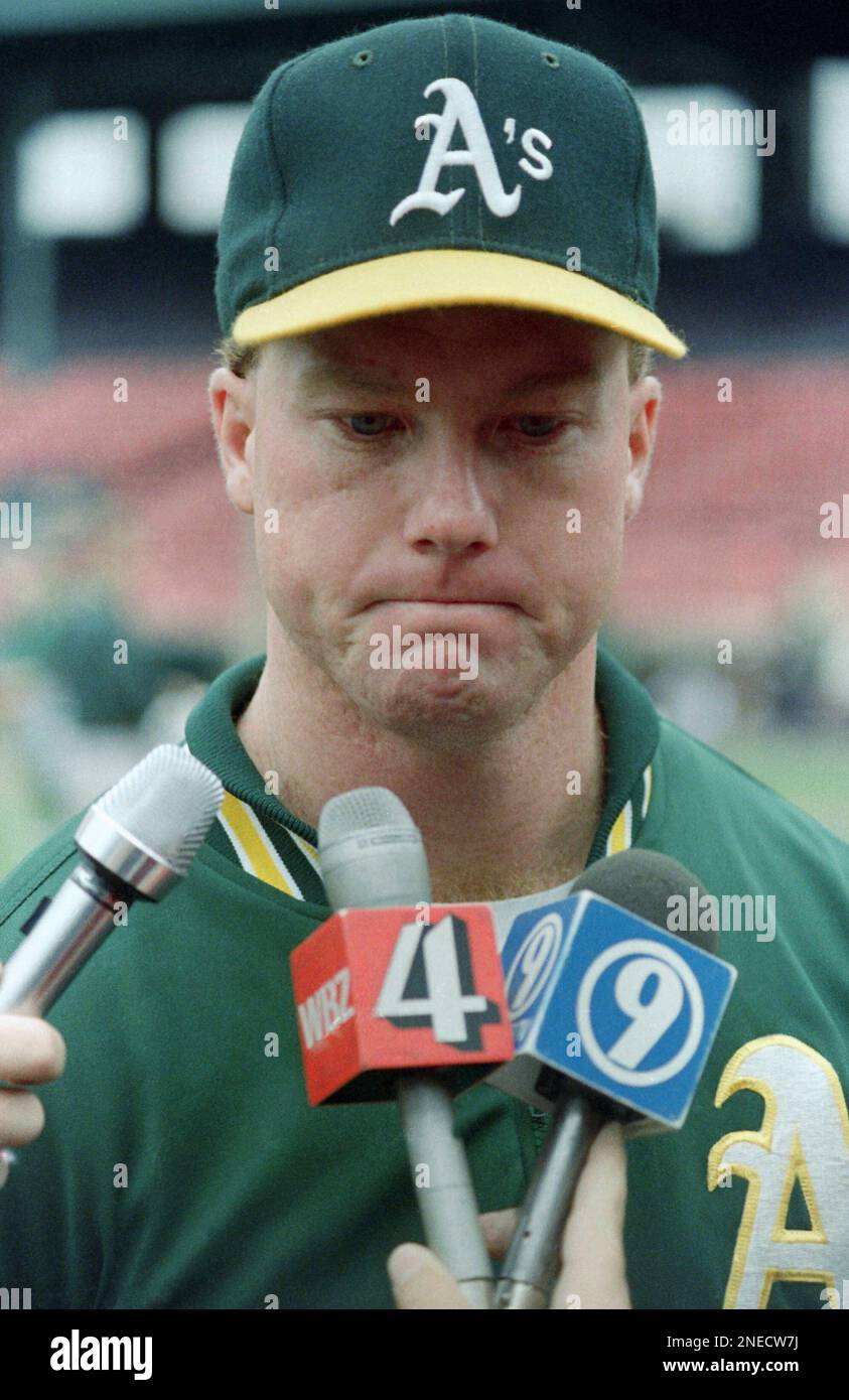 Oakland A?s first baseman Mark McGwire ponders a question as he speaks