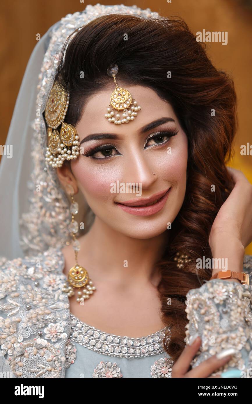 Pakistani. Indian Beautiful bride makeup for saloon shoot Stock Photo