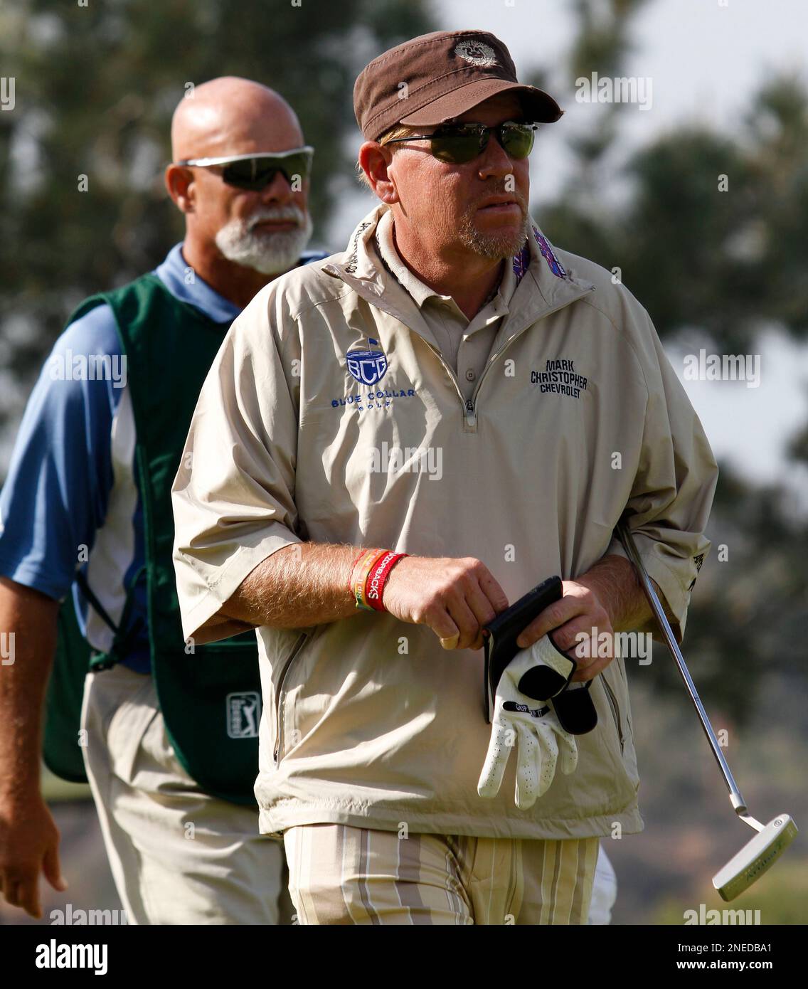 John Daly walks off the 18th green after missing the cut at the Farmers  Insurance Open golf tournament at Torrey Pines Golf Course, Friday, Jan.  29, 2010, in San Diego. Daly said