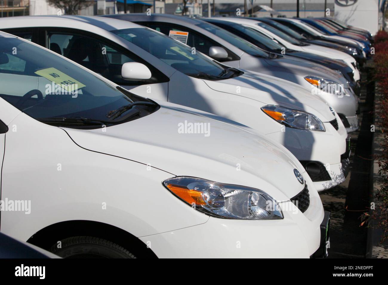 "No Sell" signs are posted in the windows of new Toyota vehicles at Wondries dealer in Alhambra
