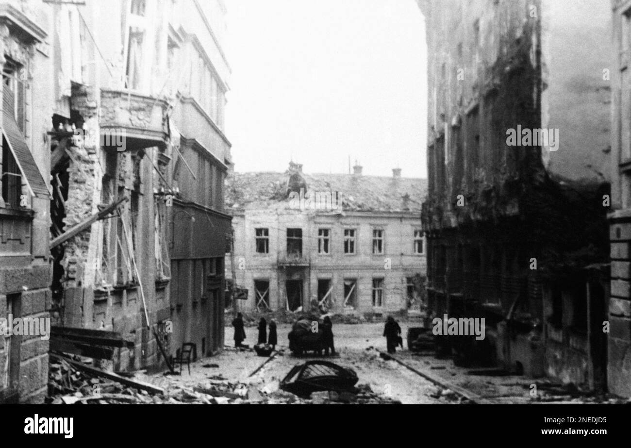 The houses are mere shells, debris is strewn all over the place and in ...