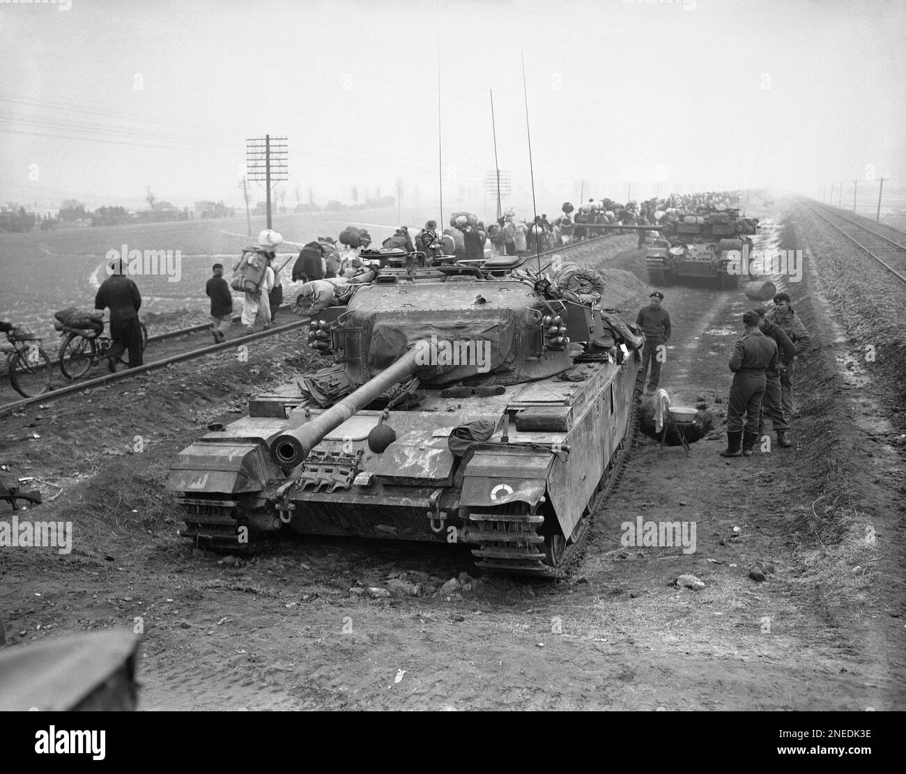 Two British centurion tanks pause to give their crews a rest and a