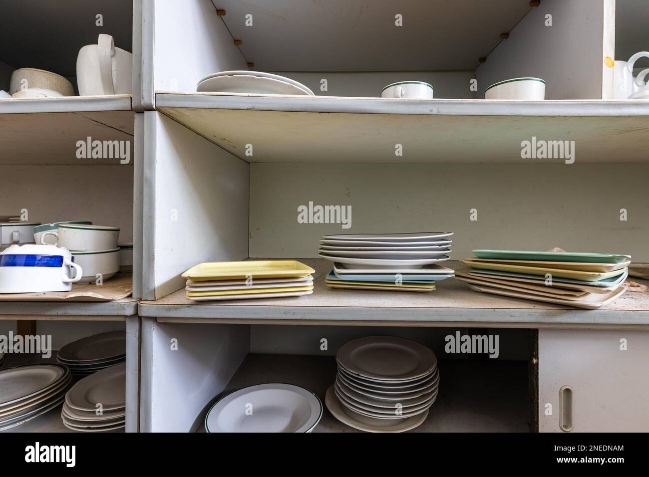 Old plates on the shelf Stock Photo Alamy