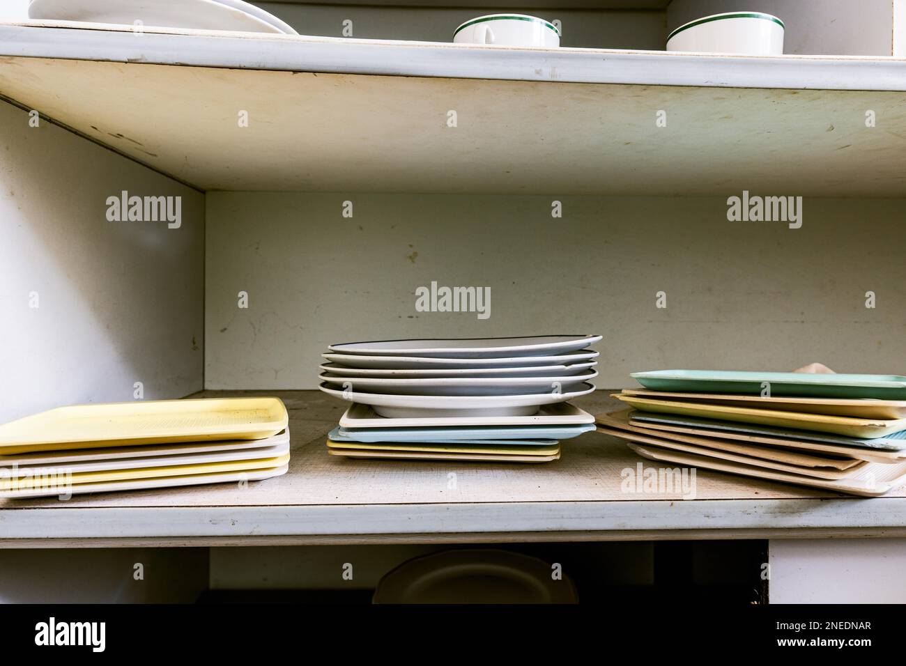 Old plates on the shelf Stock Photo Alamy
