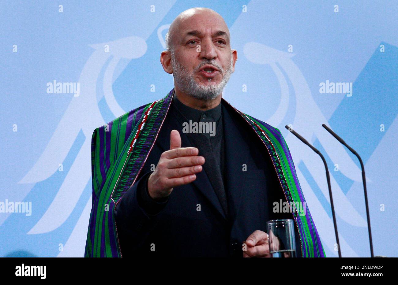 The President of Afghanistan, Hamid Karzai, adresses the media after a ...