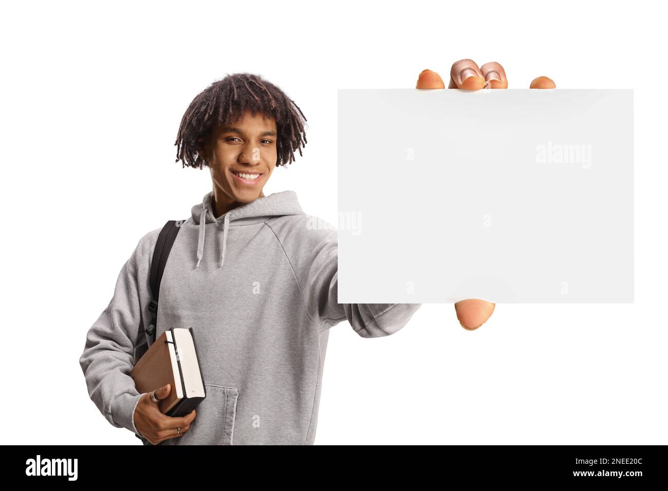 African american male student with a backpack holding books and showing ...