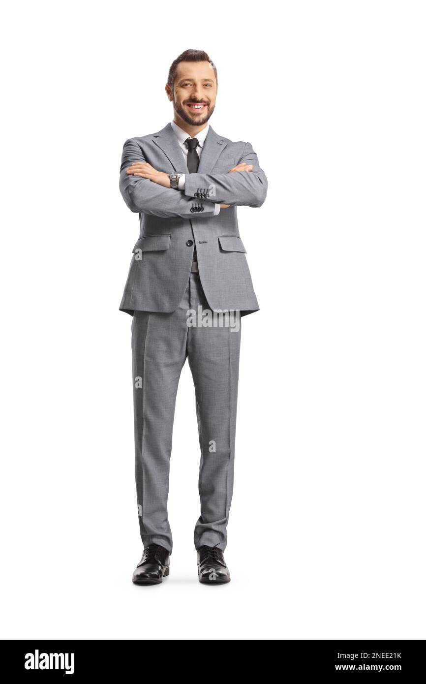 Young cheerful businessman posing with crossed arms isolated on white ...