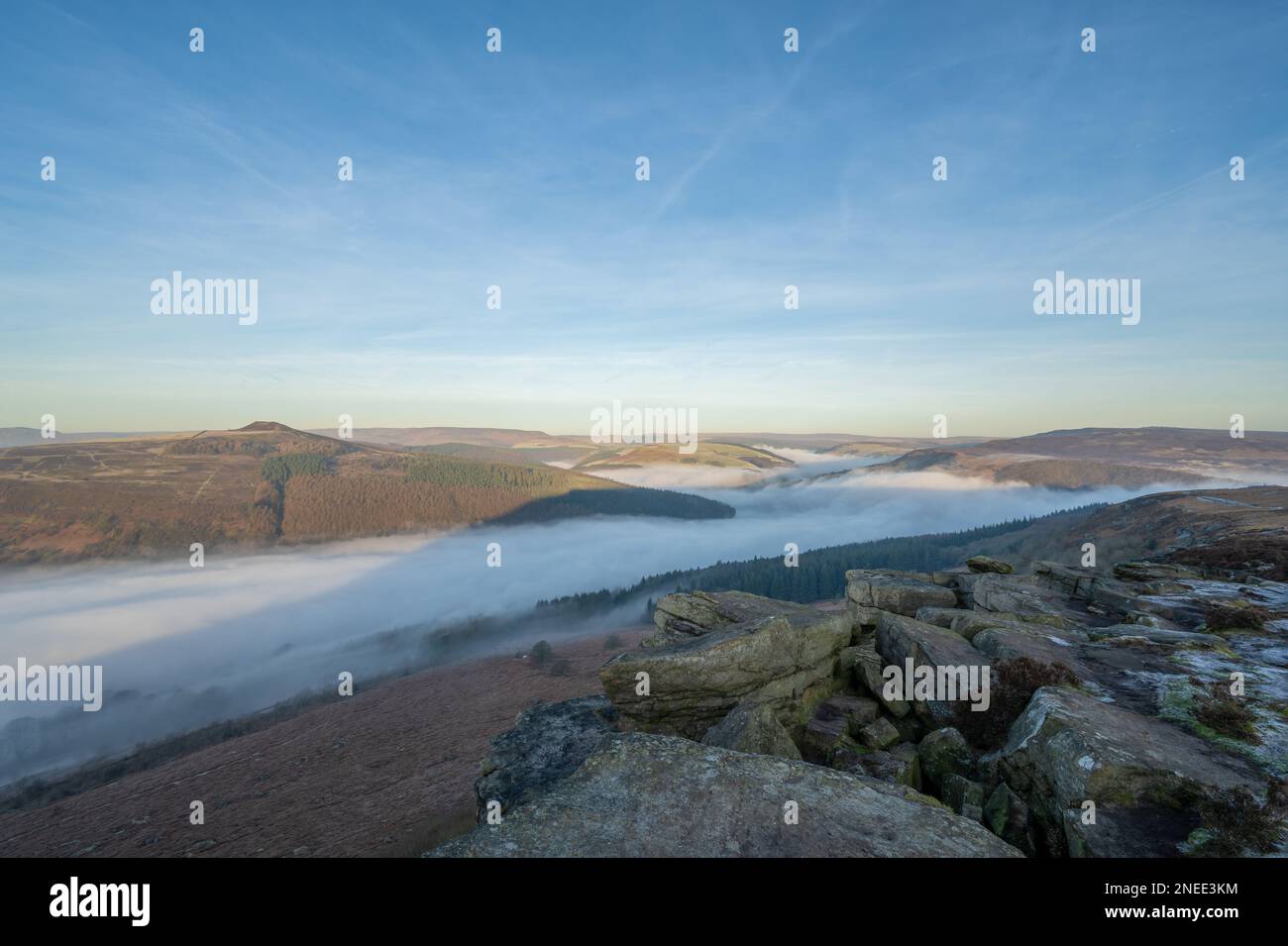 Bamford Edge. Ladybower, and Hope Valley winter sunrise temperature inversion in the Peak District National Park, England, UK. Stock Photo