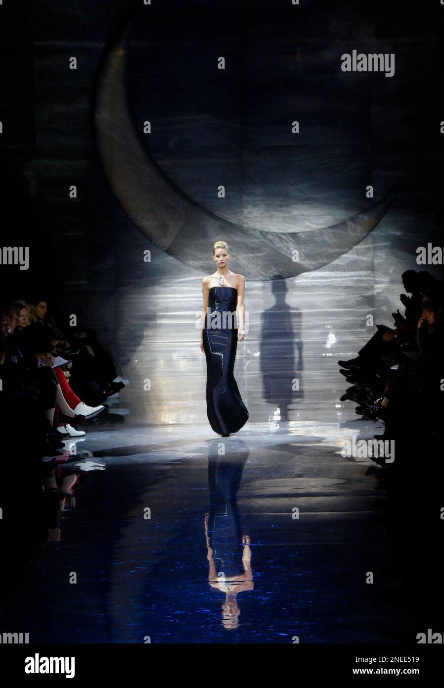 A model wears a creation by Italian fashion designer Giorgio Armani ...