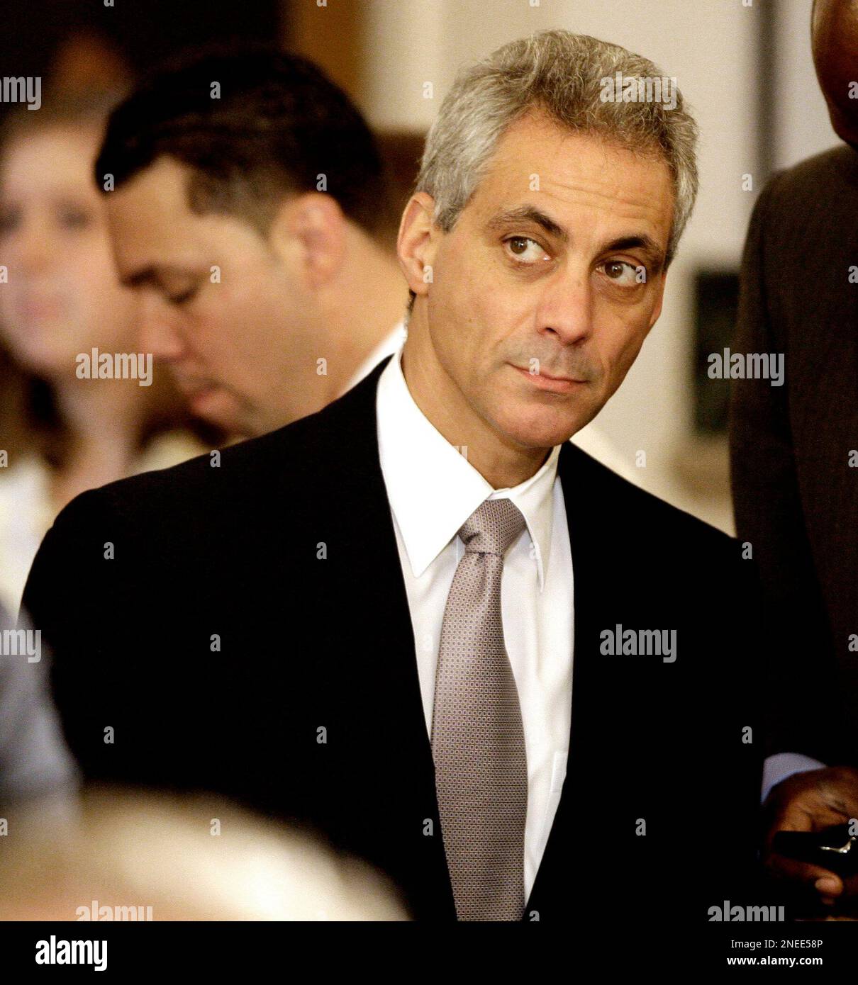 White House Chief of Staff Rahm Emanuel, watches President Barack Obama speak in the East Room of the White House in Washington, Monday, Jan. 25, 2010, during a ceremony where the president honored the NBA basketball champion Los Angeles Laker. (AP Photo/Alex Brandon) Stock Photo