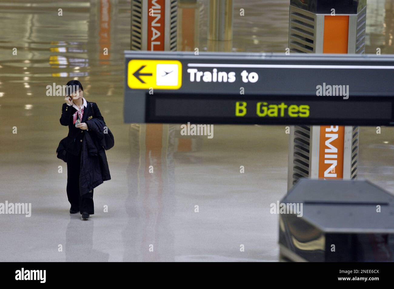Passenger walks at the main terminal in the new airport train system