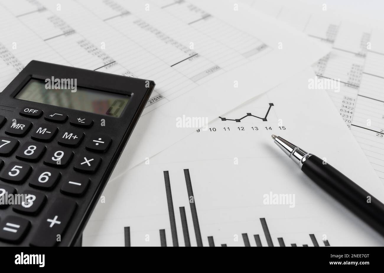 bookkeeping and accounting business concept, calculator and pen on data