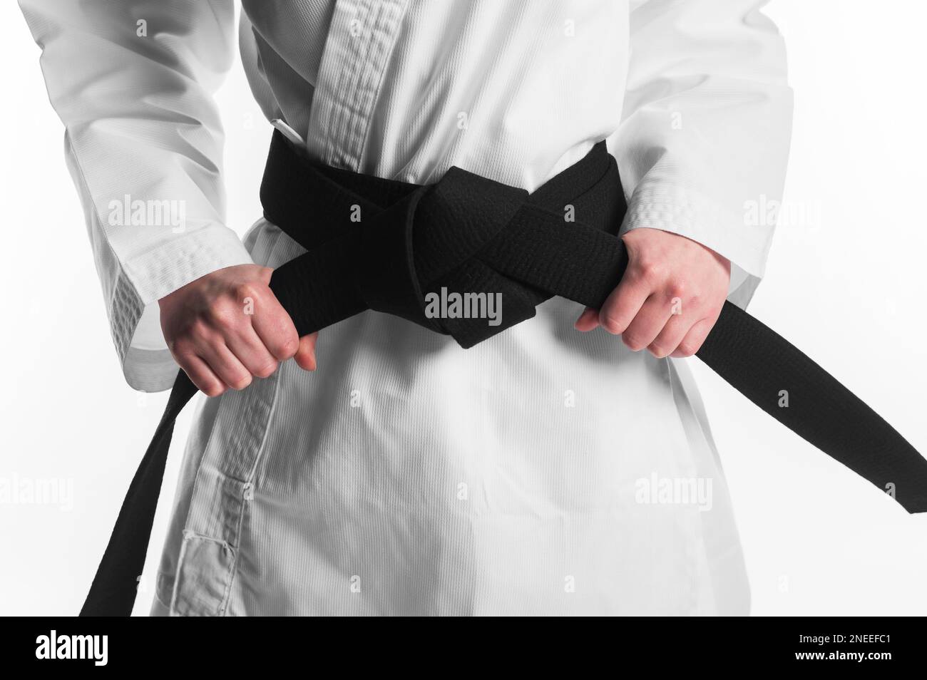 female holding karate black belt Stock Photo