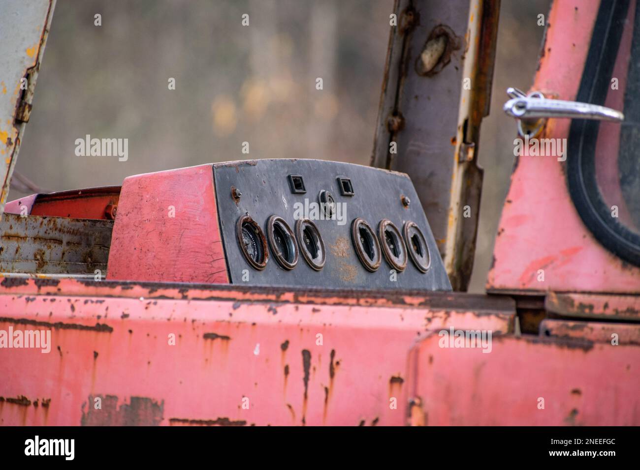 A red old tractor in field Stock Photo - Alamy