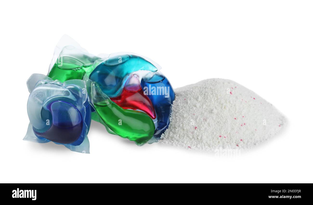 Color laundry capsules and detergent powder on white background Stock
