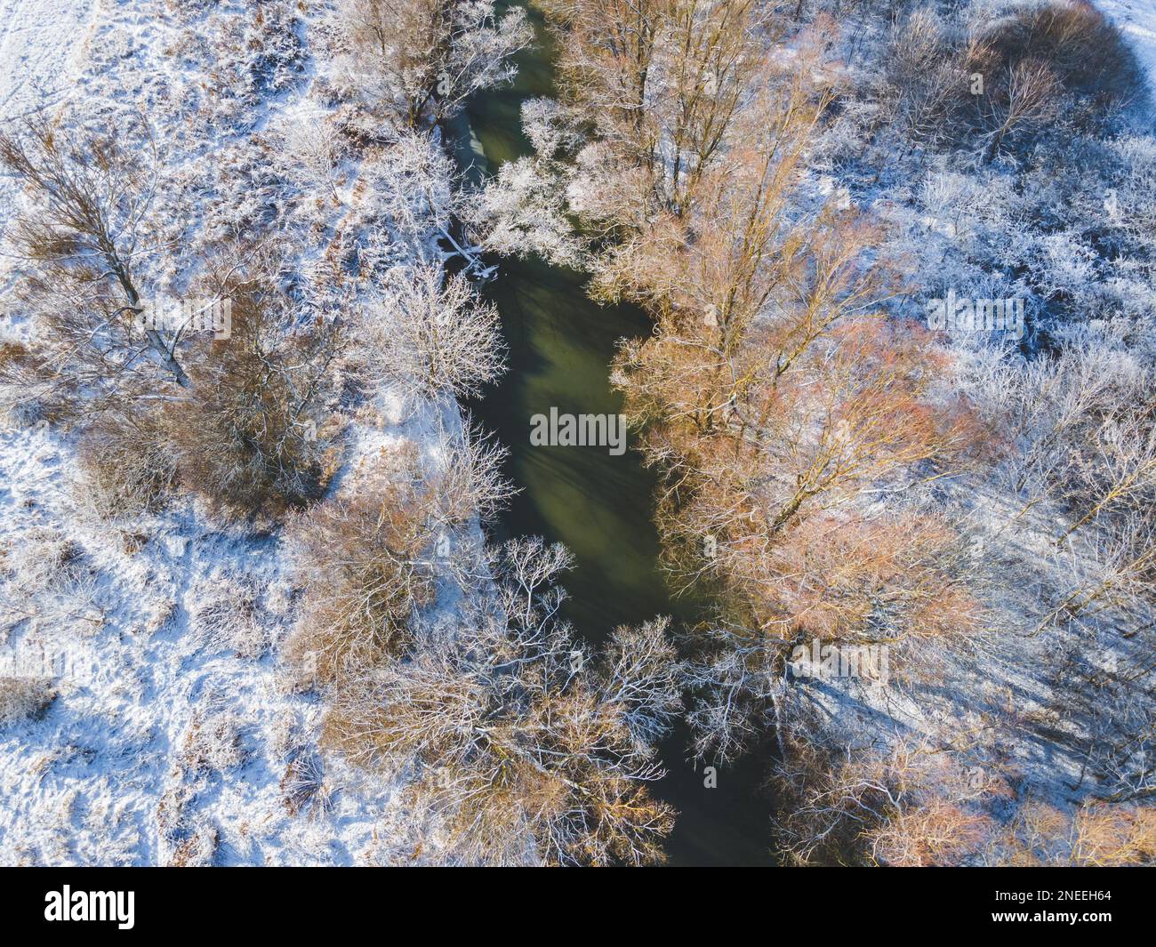Aerial view of the Ipoly river in December in a snowy environment, Balassagyarmat, Hungary Stock Photo
