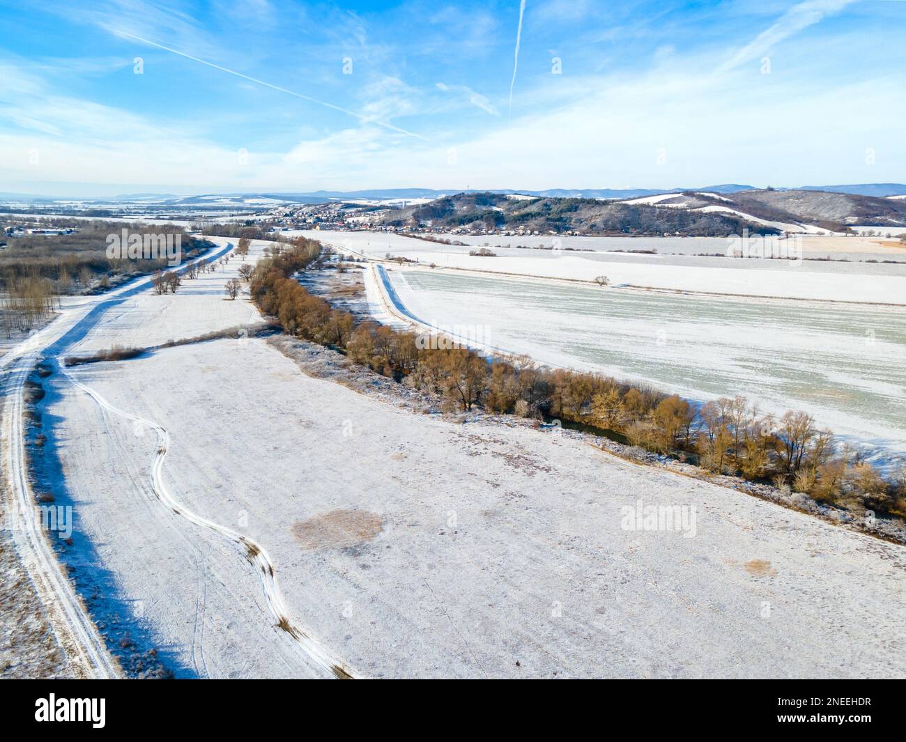 Aerial shot of a winter landscape on the banks of the Ipoly river, Balassagyarmat, Hungary Stock Photo