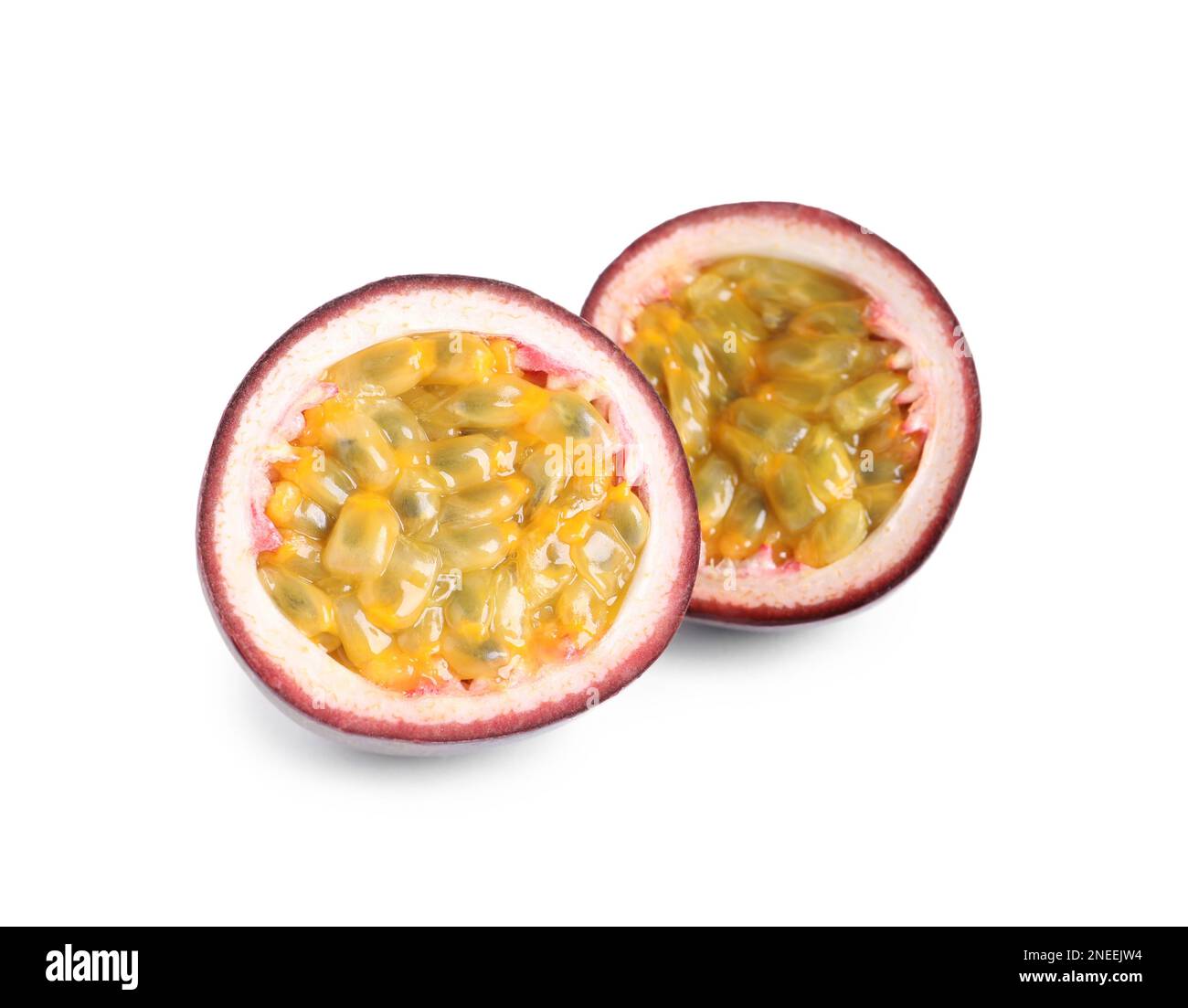 Cut ripe passion fruit isolated on white Stock Photo - Alamy