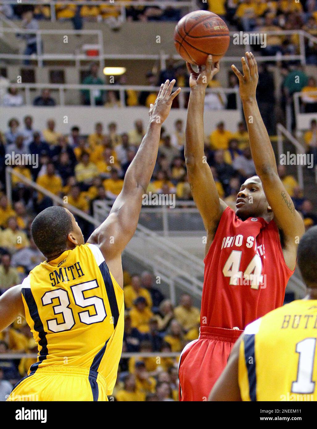 Ohio State's William Buford (44) shoots over West Virginia's Wellington