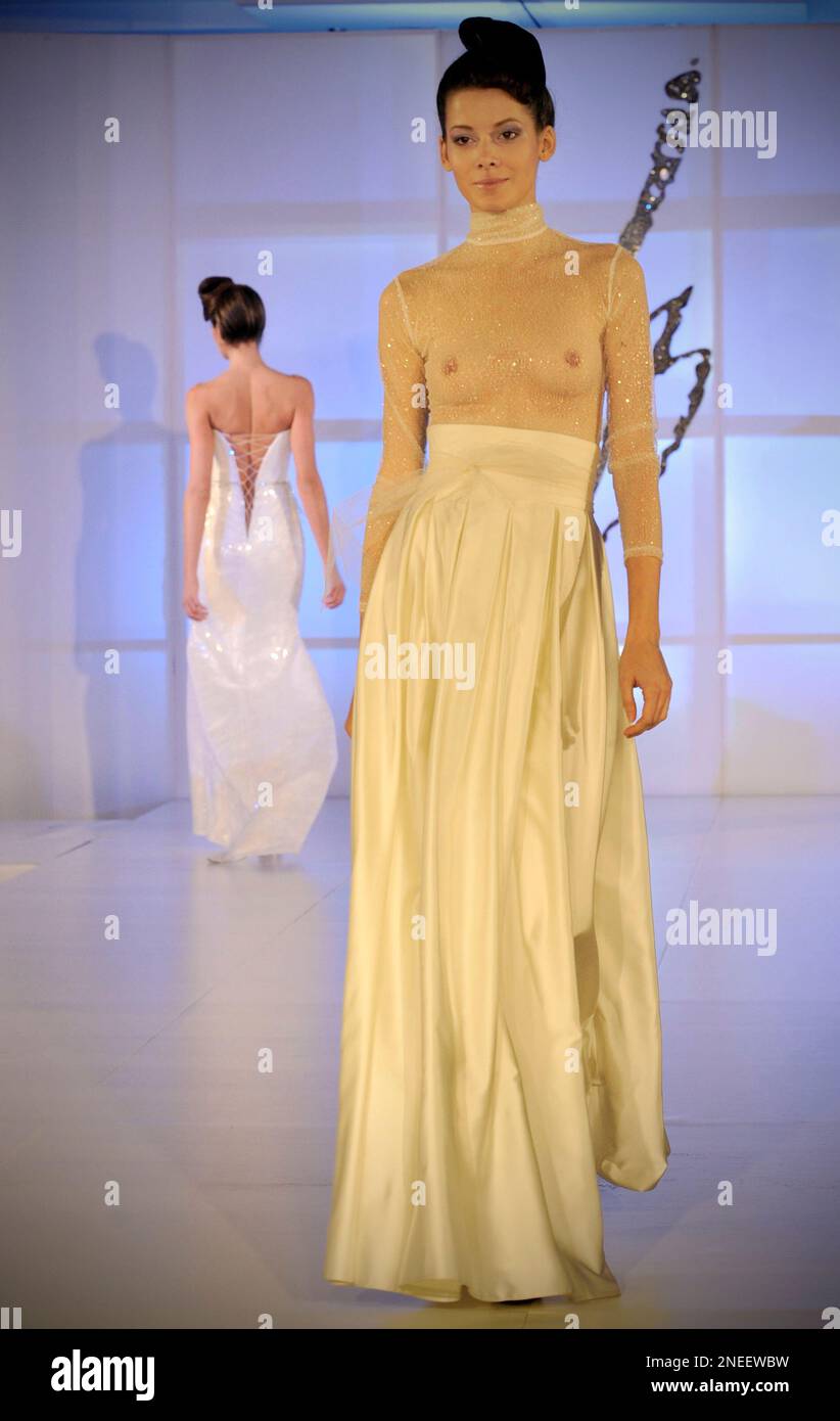 EDS NOTE NUDITY **Models present wedding dresses from the new collection of one Hungary's most respected fashion designers, Barbara Leber, in Budapest, Hungary, Friday, Jan. 22, 2010. (AP Photo/Bela Szandelszky Stock EDS NOTE NUDITY **Models present wedding dresses from the new collection of one Hungary's most respected fashion designers, Barbara Leber, in Budapest, Hungary, Friday, Jan. 22, 2010. (AP Photo/Bela Szandelszky Stock