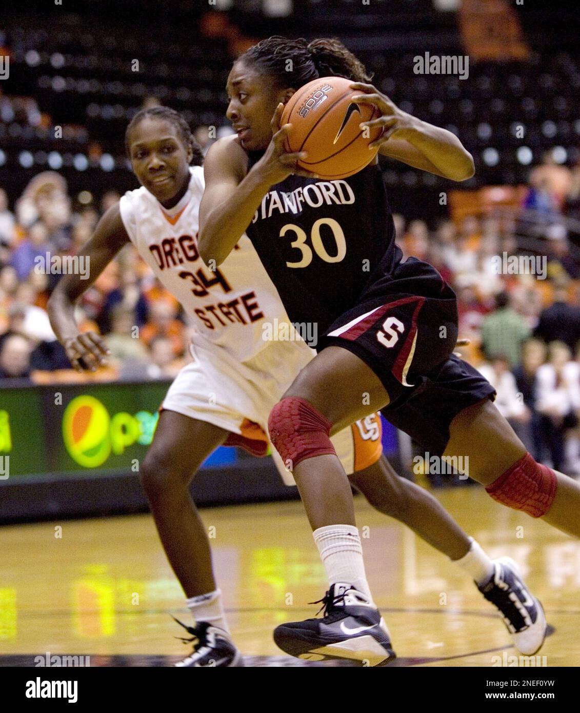 Stanford forward Nnemkadi Ogwumike , right, drives on Oregon State