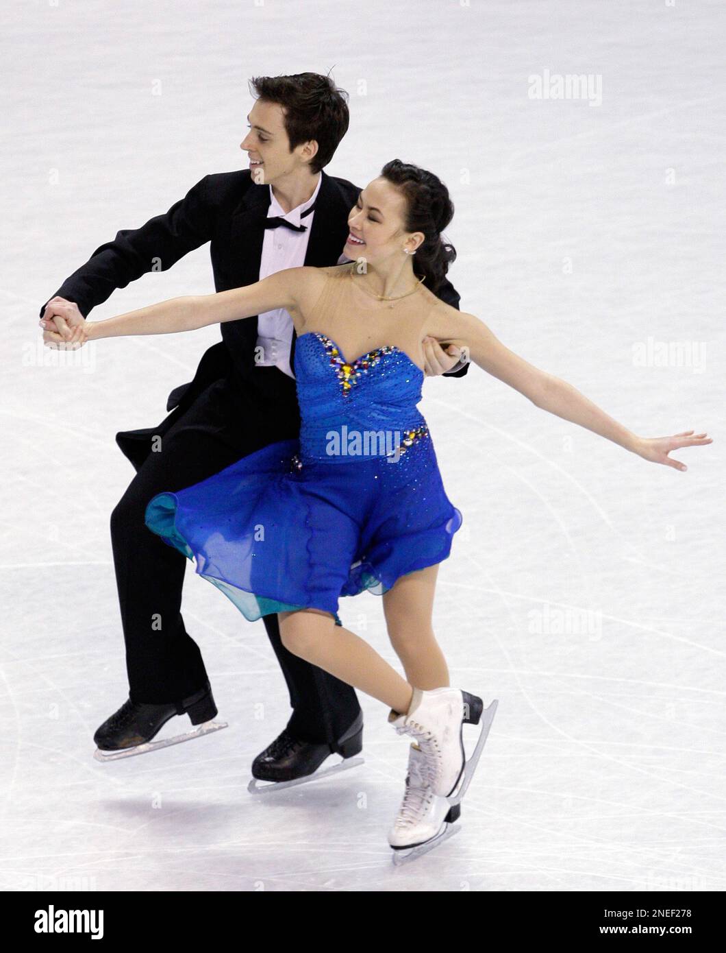 Madison Chock, right, and Greg Zuerlein skate during their