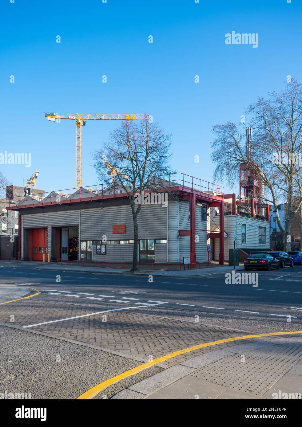 Exterior of North Kensington Fire Station (G27). Main door open revealing a fire engine. Ladbroke Grove, London, England, UK Stock Photo