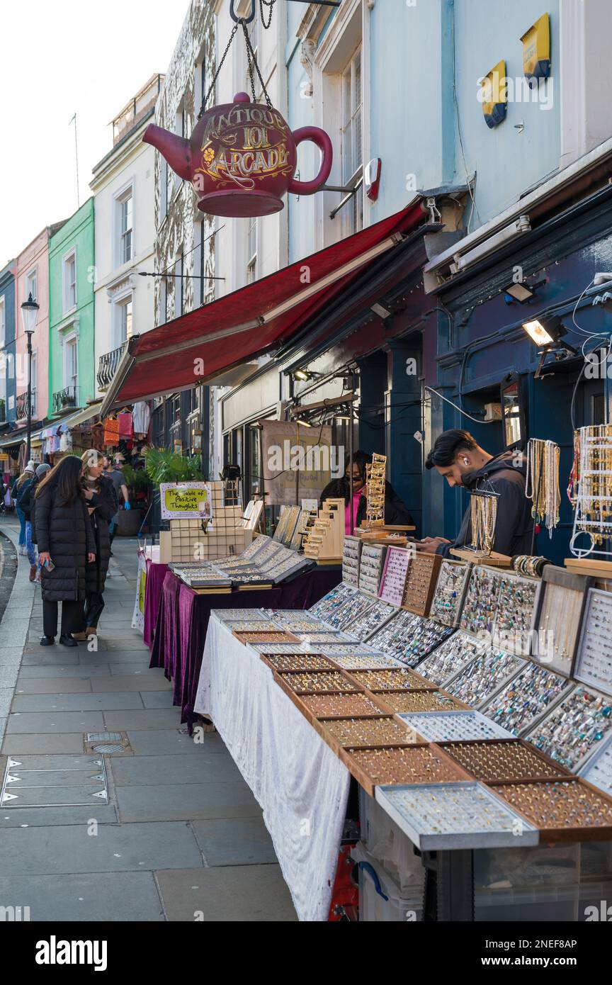 Pavement market jewellery stalls outside 101 Antique Arcade on