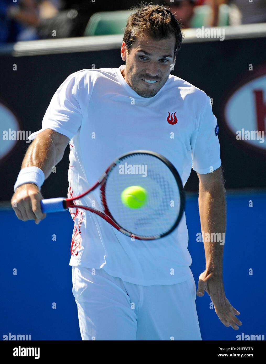 germanys-tommy-haas-returns-to-simon-gruel-also-of-germany-during-their-mens-singles-first-round-match-at-the-australian-open-tennis-championship-in-melbourne-australia-tuesday-jan-19-2010-ap-photoandy-wong-2NEFGTB.jpg