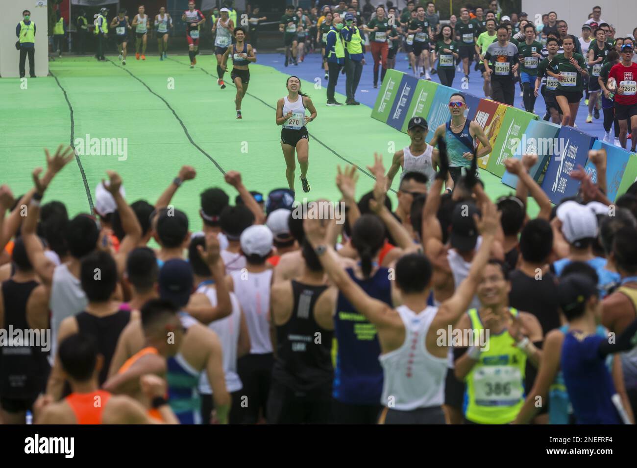 Runners Arrive The 25th Standard Chartered Hong Kong Marathon Finish