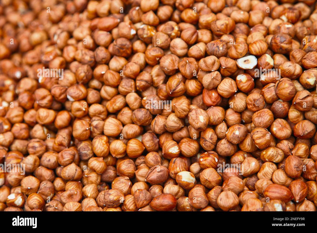 Closeup on a stack of hazelnuts on a market stall Stock Photo Alamy