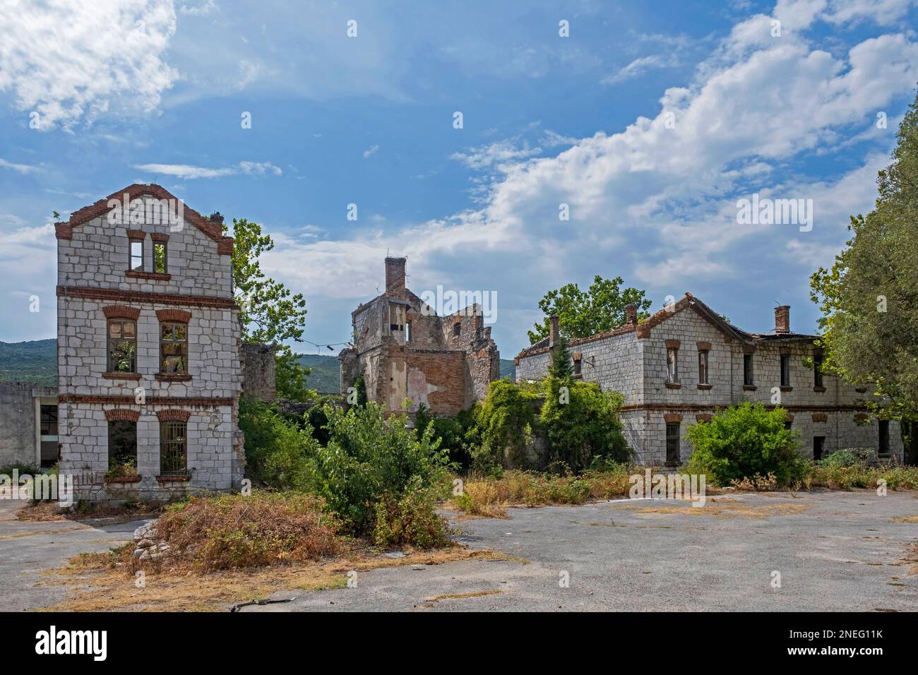 Ruined houses in the village Hum, abandoned during the Bosnian war, Trebinje, Republika Srpska, Bosnia and Herzegovina Stock Photo