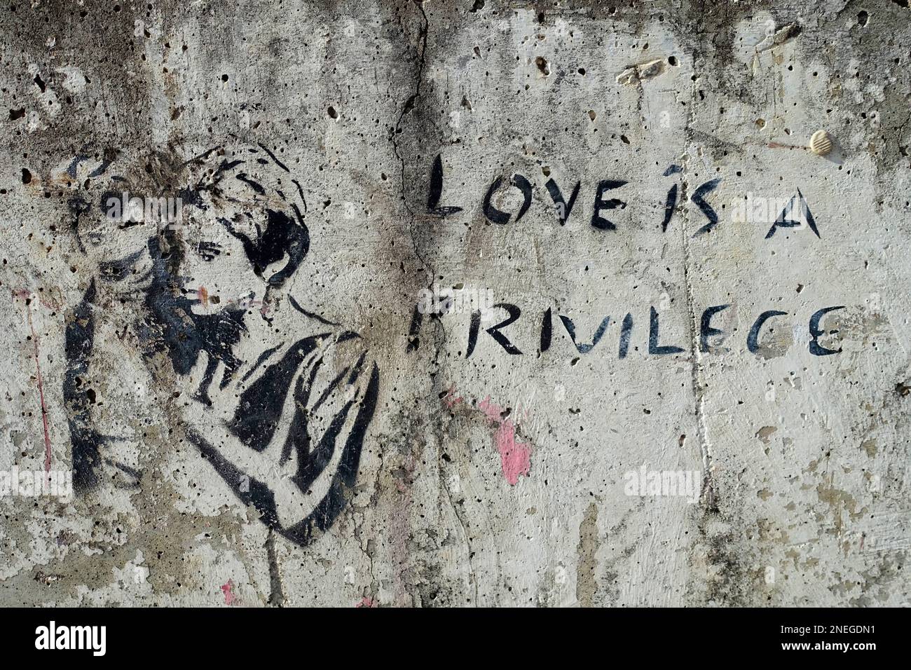 Love is a privilege, Stencil, public ground, Berlin Stock Photo