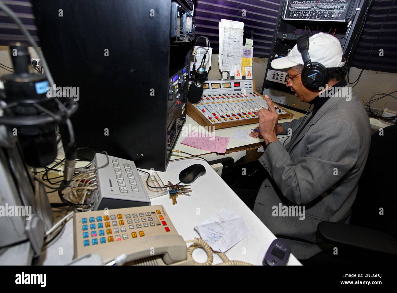 Station manager Ricot Dupuy talks to a caller at Radio Soleil, a radio  station and internet broadcast that informs the Haitian community in the  United States and beyond, in the Brooklyn borough